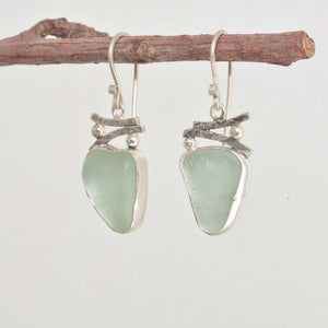Sea glass earrings in hand crafted sterling silver settings. (E627)