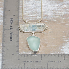 Load image into Gallery viewer, Sea glass pendant necklace in a hand crafted sterling silver setting accented with beryl and aquamarine beads (N636)
