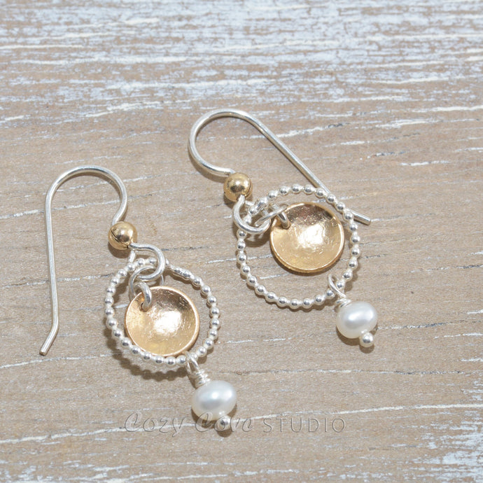 Dangle earrings in sterling silver and 14k gold fill with cultured pearls.