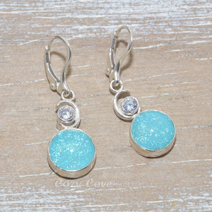 Dichroic glass dangle earrings in hand crafted sterling silver settings.
