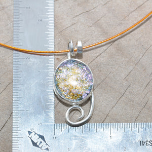 Dichroic glass pendant necklace in a hand crafted setting of sterling silver. (N691)