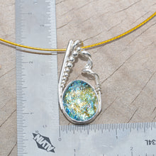 Load image into Gallery viewer, Dichroic glass pendant necklace in a hand crafted setting of sterling silver. (N693)
