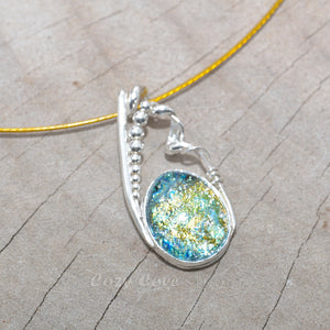 Dichroic glass pendant necklace in a hand crafted setting of sterling silver. (N693)