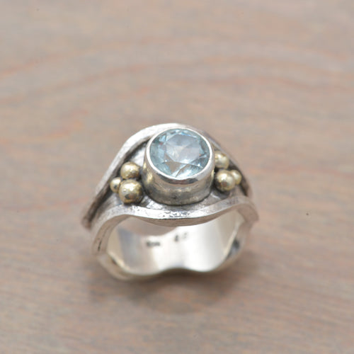 Aquamarine ring in sterling silver accented with 24K gold