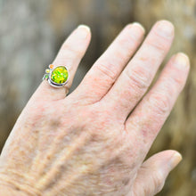 Load image into Gallery viewer, Flashy yellow and green dichroic fused glass ring in a hand crafted setting of sterling silver. (R708)
