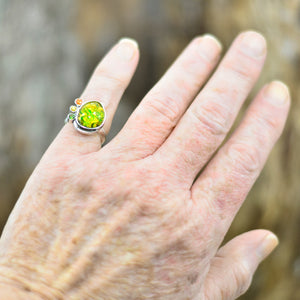 Flashy yellow and green dichroic fused glass ring in a hand crafted setting of sterling silver. (R708)