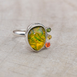 Flashy yellow and green dichroic fused glass ring in a hand crafted setting of sterling silver. (R708)