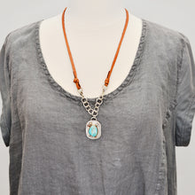 Load image into Gallery viewer, Boho style pendant necklace with turquoise in a hand crafted setting of sterling silver with 14k gold accents and a 14k gold fill bezel. (N723)
