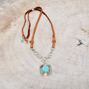 Boho style pendant necklace with turquoise in a hand crafted setting of sterling silver with 14k gold accents and a 14k gold fill bezel. (N723)
