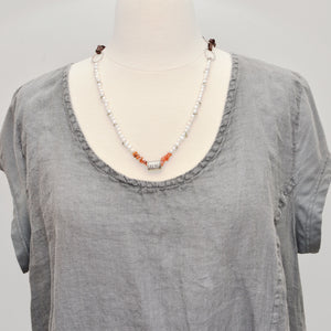 Boho pearl and red agate necklace on adjustable leather cord with handmade focal "Joy is in the Journey" bead .  (N724)