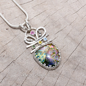 Dichoric glass pendant necklace  in a hand crafted sterling silver setting accented with sparkly cubic zirconias. (N728)