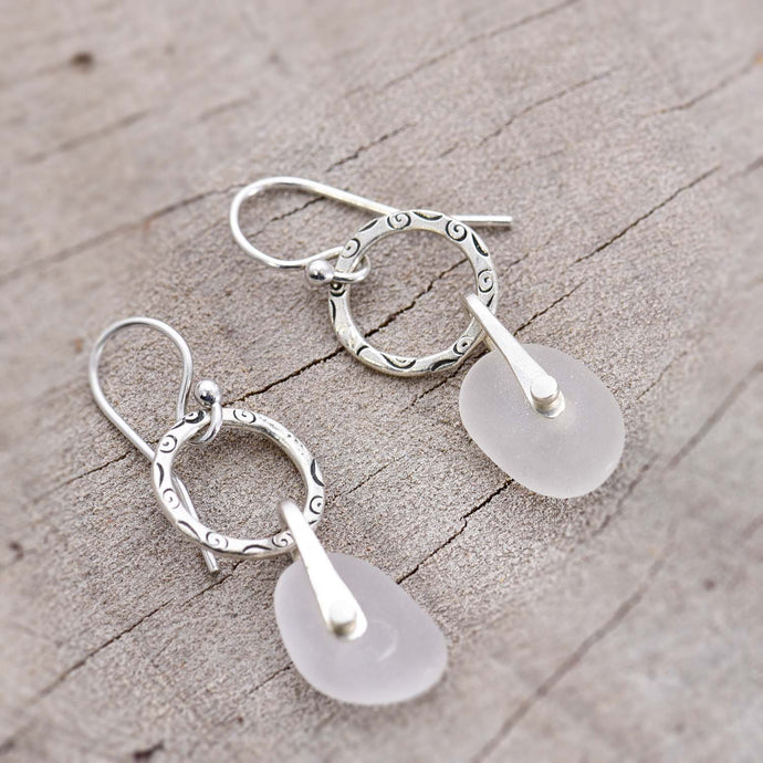 Sea glass dangle earrings in handmade settings of sterling silver. (E731)
