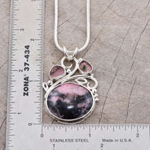 Load image into Gallery viewer, Gemstone necklace with a pink and gray rhodochrosite cabochon and bicolor tourmaline slices in an handcrafted setting of sterling silver. (N737)
