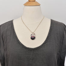 Load image into Gallery viewer, Gemstone necklace with a pink and gray rhodochrosite cabochon and bicolor tourmaline slices in an handcrafted setting of sterling silver. (N737)
