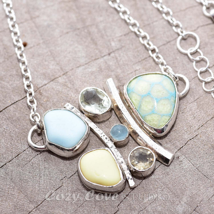 Milk glass and enamel necklace with semi-precious gemstones in a hand crafted setting of tarnish resistant sterling silver. (N740)