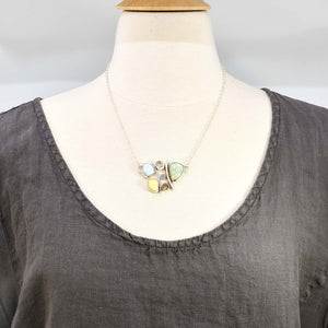 Milk glass and enamel necklace with semi-precious gemstones in a hand crafted setting of tarnish resistant sterling silver. (N740)