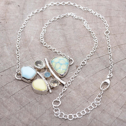 Milk glass and enamel necklace with semi-precious gemstones in a hand crafted setting of tarnish resistant sterling silver. (N740)