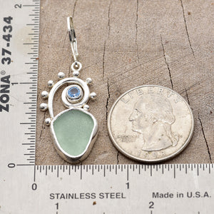 Pale seafoam green sea glass earrings in hand crafted settings of sterling silver (E775)