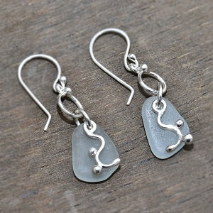 Seaglass dangle earrings with soft aqua seaglass accented with handmade sterling silver dangles. (E77)