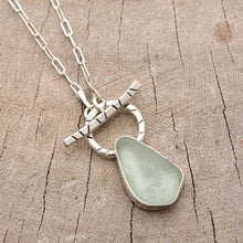 Load image into Gallery viewer, Pale green sea glass necklace in a hand crafted setting of sterling silver. (N787)

