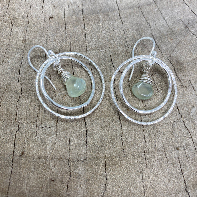 Textured sterling silver hoops encircle a wire wrapped prehnite briolette dangle (E799)
