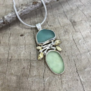 Sea glass necklace in a handcrafted setting of sterling silver accented with 18K plated gold (N801)