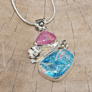 Dichroic glass pendant necklace in shades of blue and pink in a handcrafted setting of sterling silver (N810)