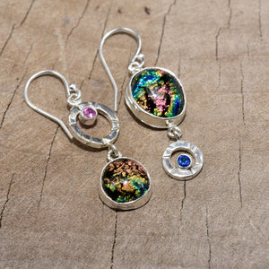 Flashy multicolor dichroic fused glass earrings in hand crafted settings of sterling silver. (E819)